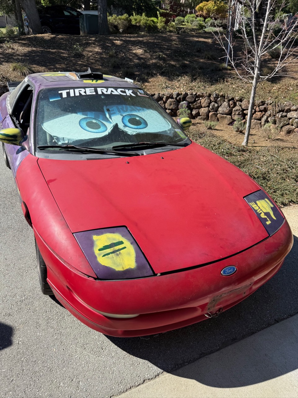 The Beast head-on with its googly eyes windshield shade